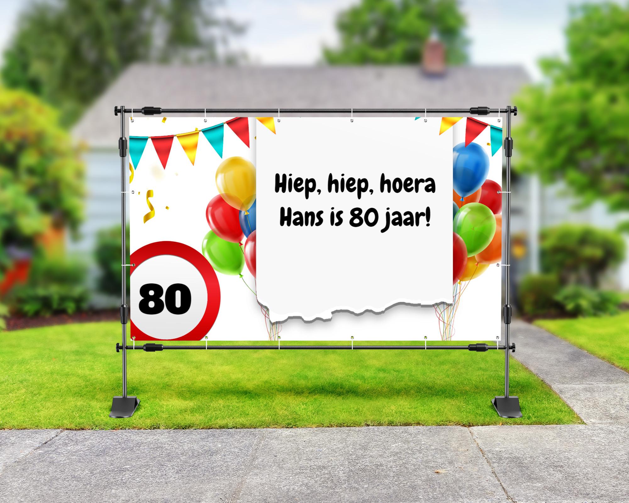 80 jaar spandoek met ballonnen en slinger